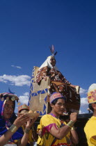 The wife of the Emperor Pachacuti being carried in her throne at Inti Raymi. Cuzco