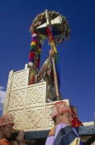 Emperor Pachacuti being carried in a golden throne at Inti Raymi.