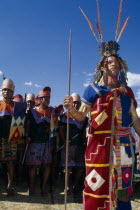 Male figure in traditional costume and feathered headress at Inti Raymi.   Cuzco