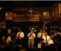 Jazz musicians inside the Maison Bourbon on Bourbon Street in the French Quarter