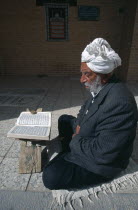 Man reading Koran