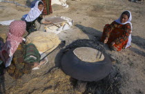 Nomads cooking Yufka or Turkish chapatti