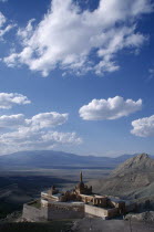 Ishak Pasha Palace. View over hillside palace toward mountainous horizon