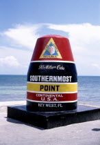 Monument to signify the southernmost point of continental USA stating 90 miles to Cuba