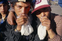 Solvent Abuse. Two gypsy boys sniffing glue from plastic bags