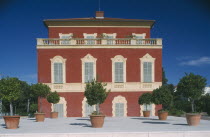 Matisse Museum facade with shrubs in pots on paved area