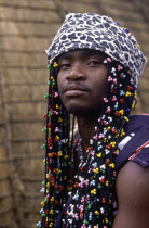 Young Zulu man with colourful beaded hair decoration