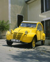 Restored old classic yellow Citroen 2CV car