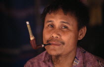 Karen refugee man smoking