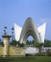 Mausoleum for Three Martyrs.  White winged sculpture in gardens.
