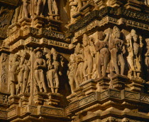 Vishvanath Temple.  Detail of ornate carved figures around side.