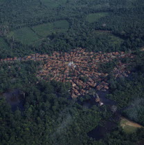 Aerial view of small town built around a mosque showing radial formation of town