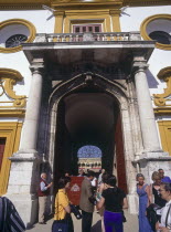 Arenal District  The Princes Gate of the 18th Century bullring with people walking through