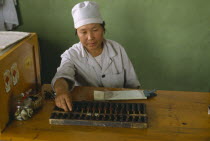 Woman using Abacus