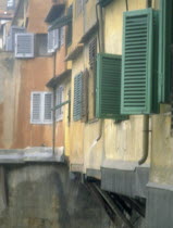 Shutters on houses on  the Ponte Vecchio over the River Arno
