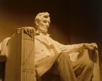 The Lincoln Memorial with the illuminated statue of Abraham Lincoln seated