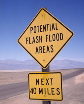 Yellow Potential Flash Flood Areas warning roadsign