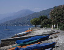 Pallanza. View along waterfront with covered boats on a slipway