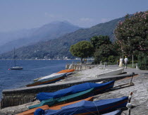Pallanza. View along waterfront with covered boats on a slipway