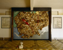 Security Prison 21 during the regime of Pol Pot now Tuol Sleng Museum.  Interior with map of Cambodia made from the skulls and bones of victims of the Khmer Rouge