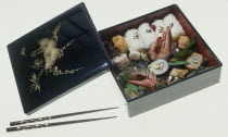 Bento box packed with meal of sushi