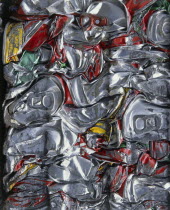 Cans crushed into a bundle and ready for recycling