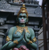 Close up of colourful statue of green monkey god Hanuman