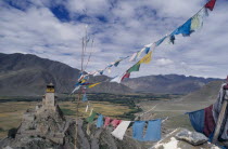 Yanbulagang Monastery with prayer flags flying in the foreground