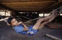Karen refugee boy in hammock