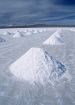 Salar de Uyuni.  Piles of salt awaiting collection.