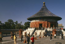 Temple of Heaven.  Hall of Prayer for Good Harvests exterior and Chinese visitors.Peking Beijing
