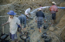 Gold workers at the source of the Ayeyarawady River at the confluence of the Mali Kha and the Ma Kha rivers in upper Myanmar.Burma