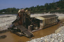 Gold dredger on the upper Ayeyarwady River operated by prospectors from the Peoples Republic of ChinaBurma Myanmar