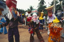 Phi Ta Khon or Spirit Festival. People in spirit costumes during parade