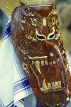 Phi Ta Khon or Spirit Festival. Person wearing elaborate spirit mask