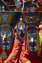 Phi Ta Khon or Spirit Festival. People wearing brightly coloured spirit masks Colored