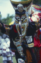 Phi Ta Khon or Spirit Festival. Person wearing spirit mask