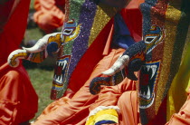 Phi Ta Khon or Spirit Festival. People wearing brightly coloured spirit cotumes Colored