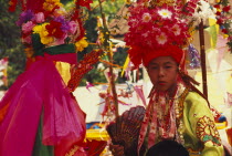 Shan Poi San Long. Crystal Children ceremony with Luk Kaeo in costume at stupa Wat Pa Pao