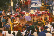 Songkran aka Lunar New Year festival parade to Wat Phra Singh with floats depicting the years of the rat and ox