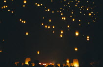 Loi Krathong Festival aka Yi Peng. People launching hot air balloons into the night sky