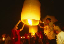 Loi Krathong Festival aka Yi Peng. People launching hot air balloons into the night sky