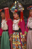 Young Lisu women in their New Year finery dancing