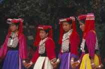 Young Lisu women dancing in their New Year finery
