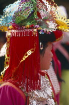 Portrait of a young Lisu woman in her New Year finery during a dance