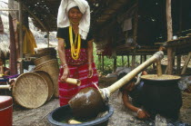 Karen Sgaw woman brewing rice liquor
