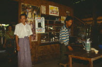 AIDS signs surrounding mirror in a restaurant Burma