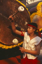 Traditional Thai drummer with large drum in the Flower Festival parade