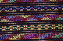 Close up detail of a Lacid womans sarong which is traditional Kachin attireBurma Leis