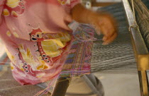Silk weaving at the weavers group in Bahn Mai Mawk Jahm